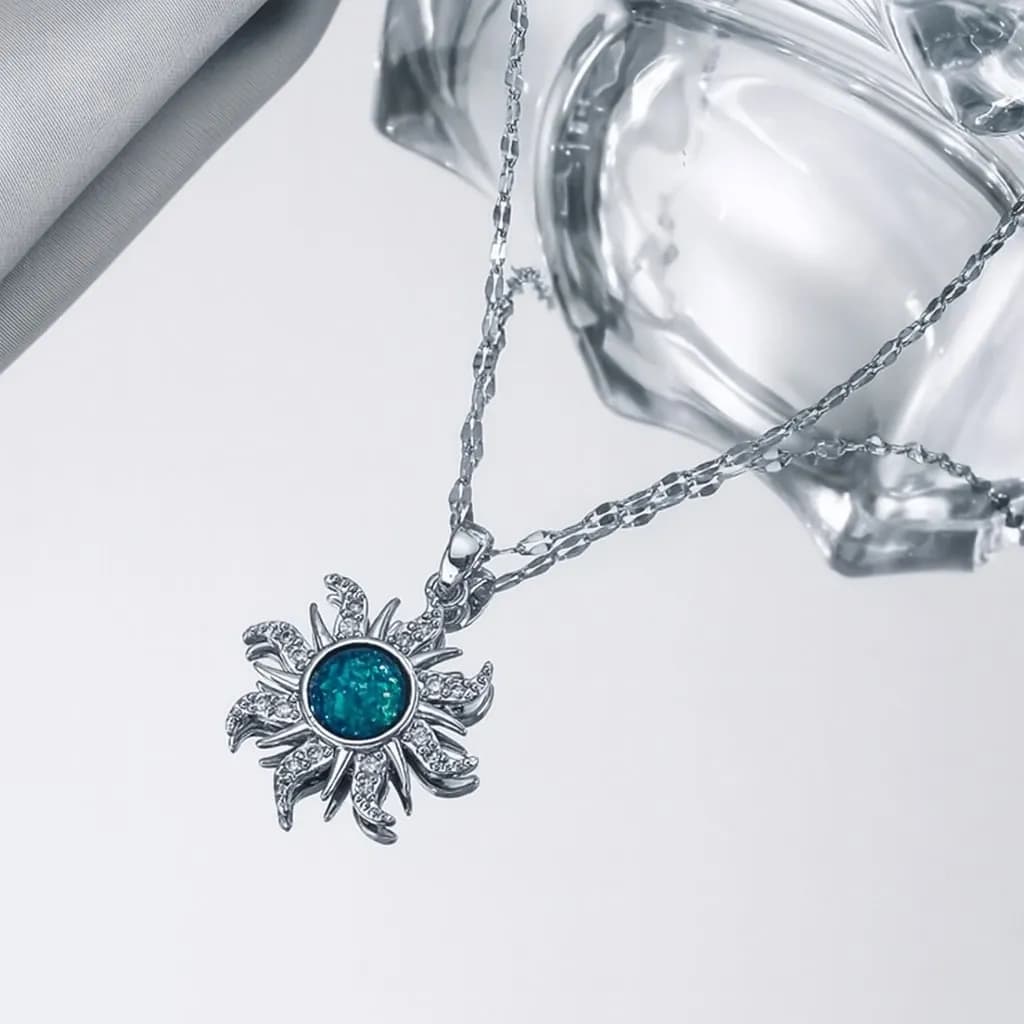 Çelik Gümüş Renk Güneş Firuze Kolye